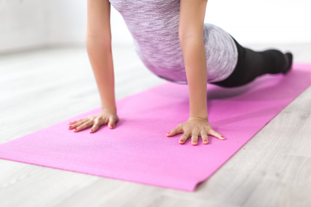 self-care for your body-woman on yoga mat